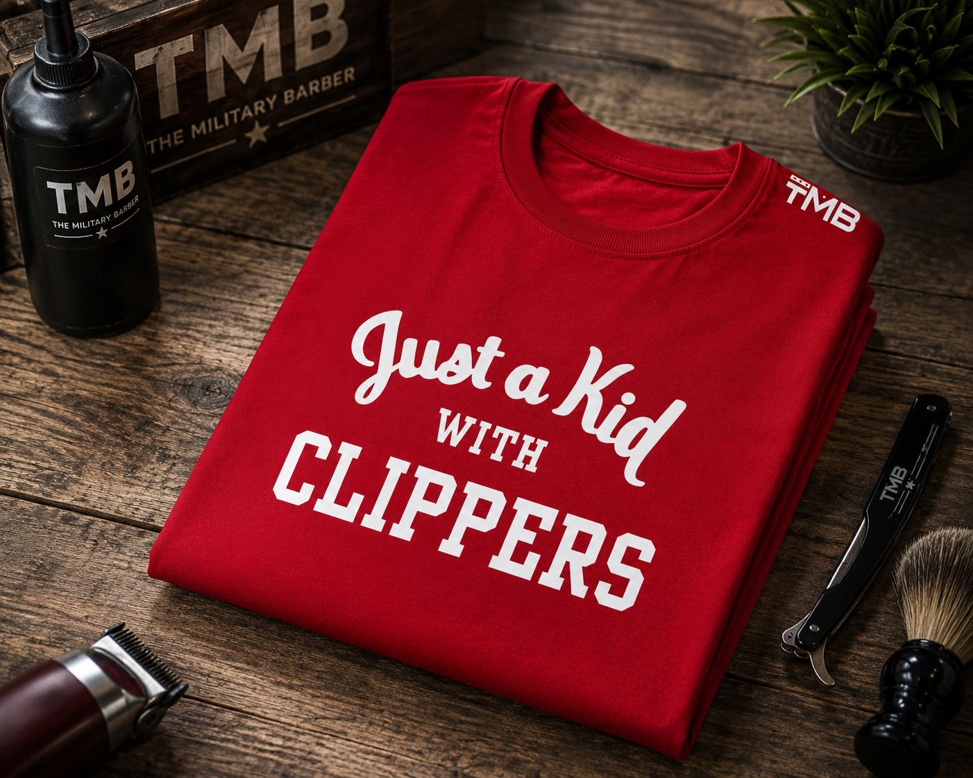 KID WITH CLIPPERS TEE