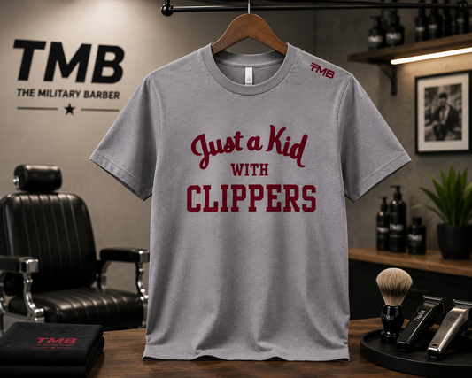 KID WITH CLIPPERS TEE